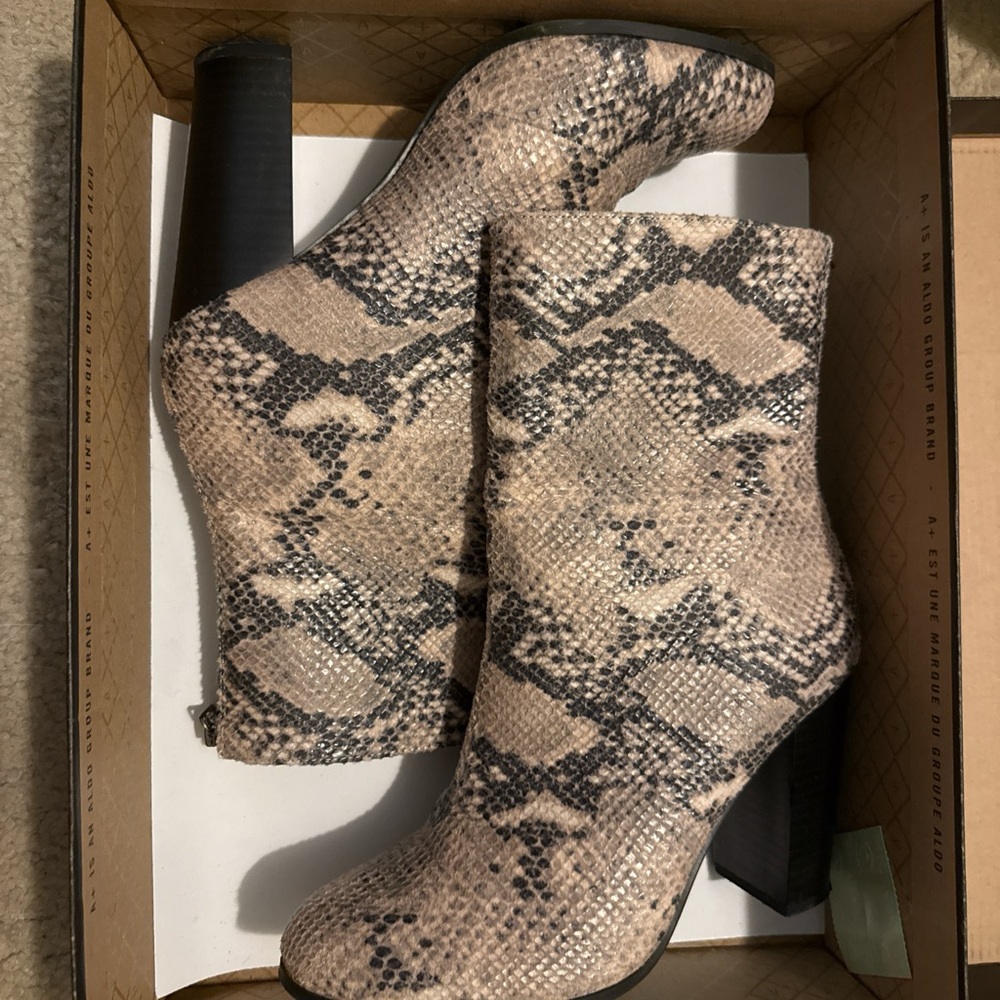 Aldo Cream and Black Heeled Boots with Sleek Silhouette